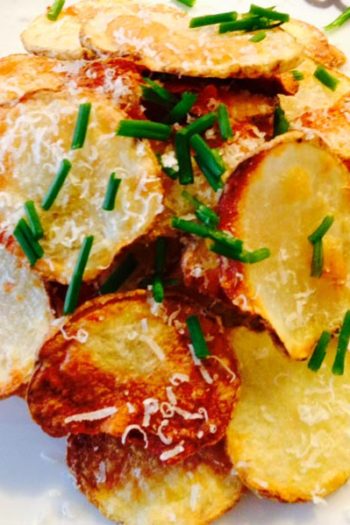 Homemade Parmesan Potato Chips Recipe- that is oven baked perfection. Grab your potatoes, Parmesan, and smiles. This is super easy #comfortfood. www.ChopHappy.com