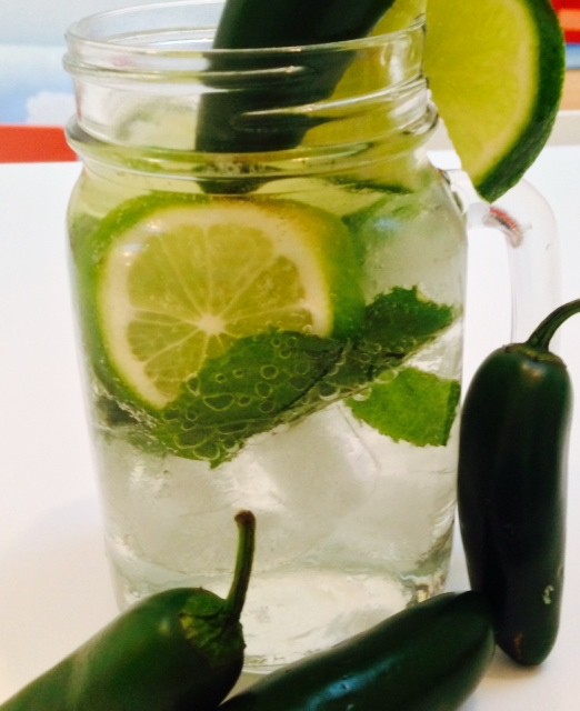 Jalapeno Mint Mojito Recipe - is the perfect cocktail for an easy quick recipe. You do not need any fancy equipment. Literally everything goes in a mason jar and cheers. Happy Cooking www.ChopHappy.com