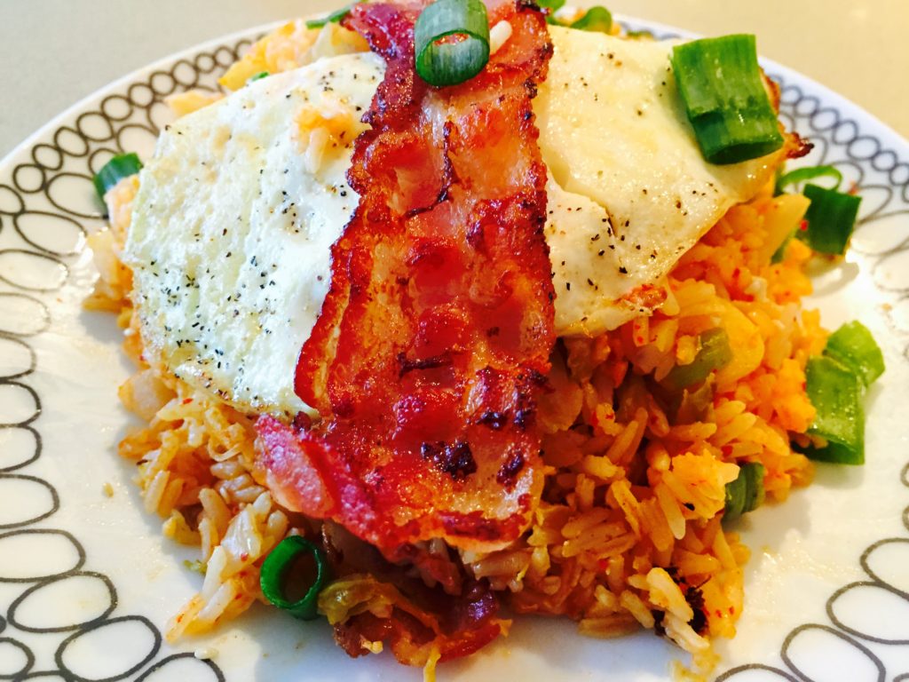 Kimchee and Bacon Fried Rice Recipe that is easy comfort food. This is faster then take out and perfect weeknight dinner. www.ChopHappy.com