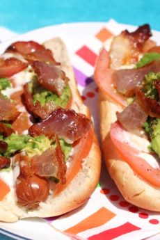 Bacon Avocado Dog Recipe - is so easy you get instant comfort food satisfaction. Grab hot dogs, avocado, and bacon. Happy Cooking. www.ChopHappy.com #bltrecipe #hotdog