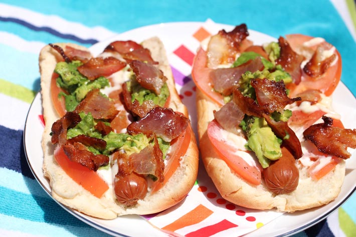 Bacon Avocado Dog Recipe - is so easy you get instant comfort food satisfaction. Grab hot dogs, avocado, and bacon. Happy Cooking. www.ChopHappy.com #bltrecipe #hotdog