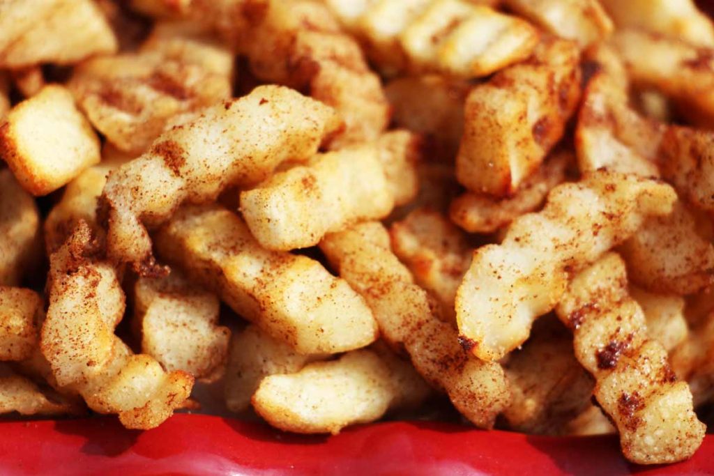 Cinnamon Sugar French Fries - are so easy and fries for dessert. Grab frozen fries and fall seasonings and start the smiles. www.ChopHappy.com