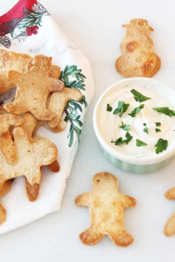 Christmas Tortilla Chips Recipe - is so christmas festive. This appetizer is is so easy to make. Grab tortillas, salt, garlic poweder, and make fun shapes. www.ChopHappy.com