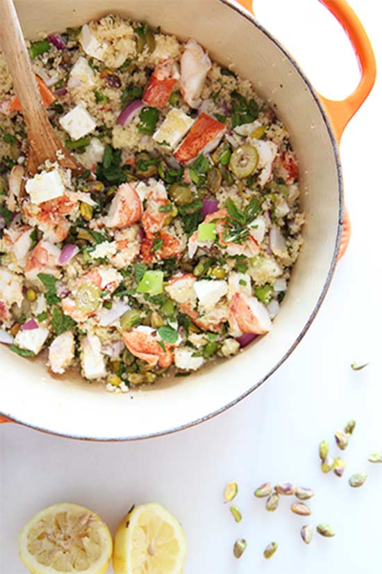 Lobster Couscous Recipe ( 10 minute meal)- a little lobster and alot of veggies makes this bright lemony dish smile every bite. The key is to go high-low. A small amount of lobster mixed with fresh mint, salty feta, and garlicky couscous. l www.ChopHappy.com