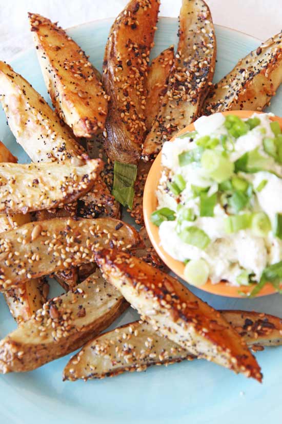 Everything Bagel Fries w/ Scallion Cream Cheese Dip Recipe - is fun appatizer the whole family will love. Grab seasoning, potatoes, and fun for this comfort food recipe. www.ChopHappy.com