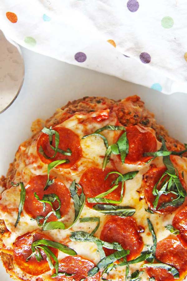 Meatloaf Pizza Recipe that is done in half the time of regular #meatloaf recipe. Meatloaf replaces #pizza crust. This is juicy meaty, and cheesy pizza. The #weeknight dinner table will feel like the weekend with this #recipe. www.ChopHappy.com 