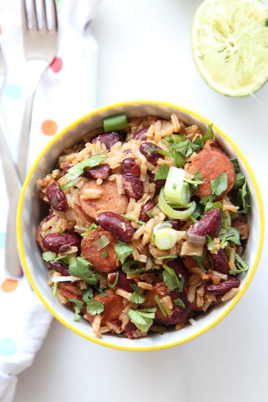 One Pot Rice and Beans Recipe- #Dinner could not get any easier and faster then fluffy buttery #rice and #beans. Everything cooks in one glorious pot. This means less clean up and more time to watch your favorite shows on TV.  www.ChopHappy.com