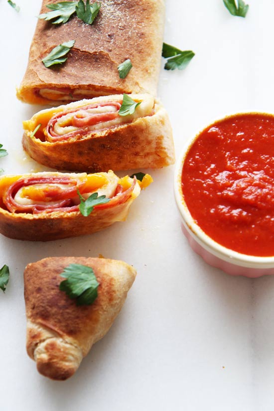 Salami Stromboli Recipe - that is whats for dinner on a busy weeknight. It takes 20 minutes from start to finish to have a hot bubbly cheesy filled dinner. www.ChopHappy.com