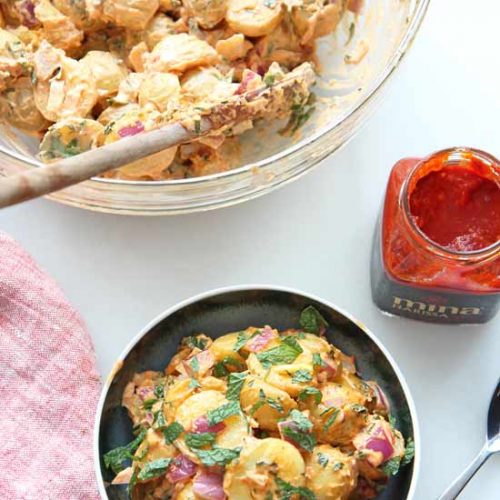 Creamy Harissa Potato Salad Recipe. This spicy, sweet and tangy #potatosalad is super easy to make and is perfect make ahead recipe. Happy #comfortfood cooking! www.ChopHappy.com