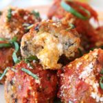 Eggplant Parmesan Meatballs Recipe. This recipe is so much easier then salting and bring every eggplant individually. Everything goes in a blender and then becomes a #meatball. Super easy indulgent #comfortfood. Happy Cooking! www.ChopHappy.com