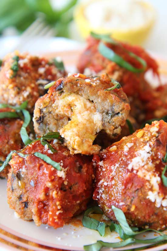 Eggplant Parmesan Meatballs Recipe. This recipe is so much easier then salting and bring every eggplant individually. Everything goes in a blender and then becomes a #meatball. Super easy indulgent #comfortfood. Happy Cooking! www.ChopHappy.com