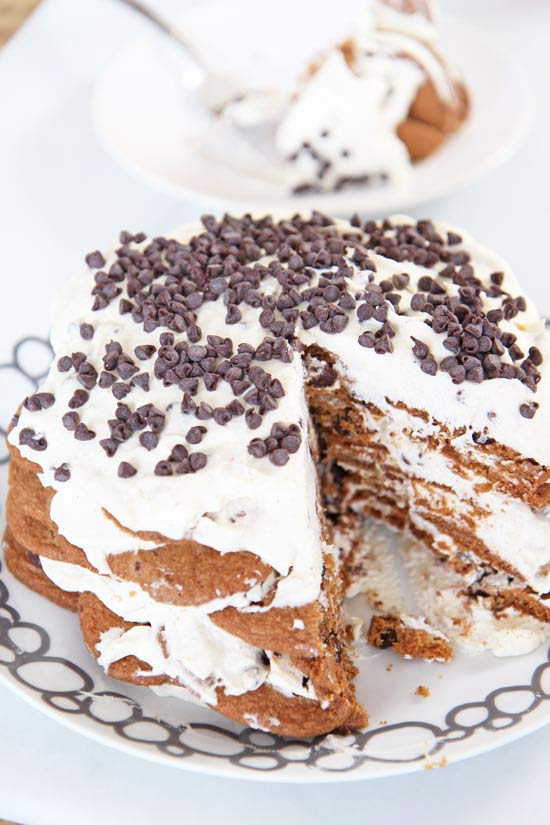 Cannoli Ice Box Cake Recipe. This is the easiest no bake dessert. Whip cream add ricotta, and warm spices. Layer cream and cookies. Then eat this indulgent cake. www.ChopHappy.com #cookies #iceboxcake #cannoli