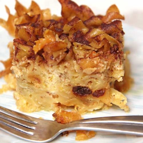 Slow Cooker Noodle Kugel (Noodle Pudding) Recipe. This is a sweet custard that has juicy chunks of peaches and raisins. Also warming cinnamon to hug you. Perfect side dish or a staple on Jewish Holiday tables. Happy Cooking! www.ChopHappy.com #kugel #noodles