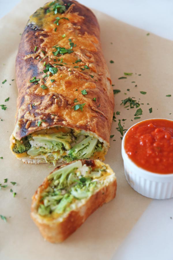 Broccoli and Cheese Stromboli Recipe. This is the perfect weeknight cheesy, meatless Monday. Happy Cooking! www.ChopHappy.com #broccoli #easyrecipe