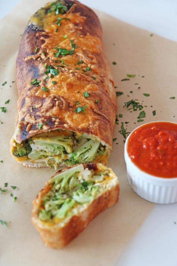 Broccoli and Cheese Stromboli Recipe. This is the perfect weeknight cheesy, meatless Monday. Happy Cooking! www.ChopHappy.com #broccoli #easyrecipe 