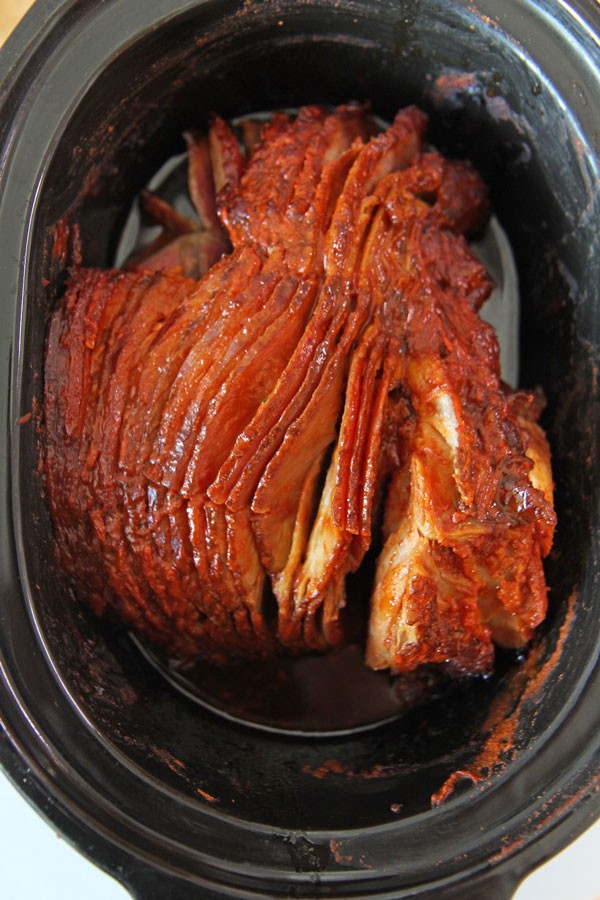 Slow Cooker Gochujang Glazed Ham Recipe. This is one of the easiest recipes on my food blog. Its 3 ingredients. You have Korean chili paste gochujang, sweet honey, and honey baked spiral ham. This is a perfect weeknight recipe or Easter recipe. Happy Cooking! #slowcookerrecipe #ham #Easterrecipe