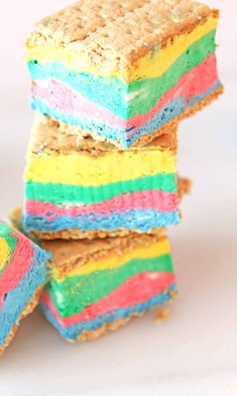 3 Ingredient Rainbow Ice Cream Bar Recipe. Sipmle recipe that uses whipped cream and magic of the rainbow. This is a no bake