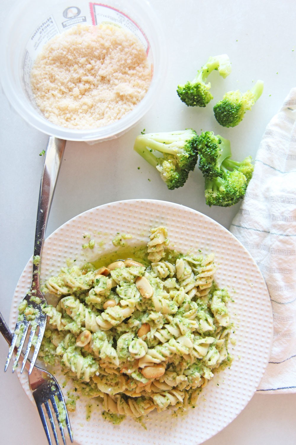How to Make Broccoli Pesto Recipe. Grab broccoli, arugula, Parmesan, peanuts, and extra virgin olive oil. The secret ingredient is red wine vinegar to brighten it up. This is a 10 minute dinner recipe. Happy Cooking! www.ChopHappy.com #broccoli #pastarecipe