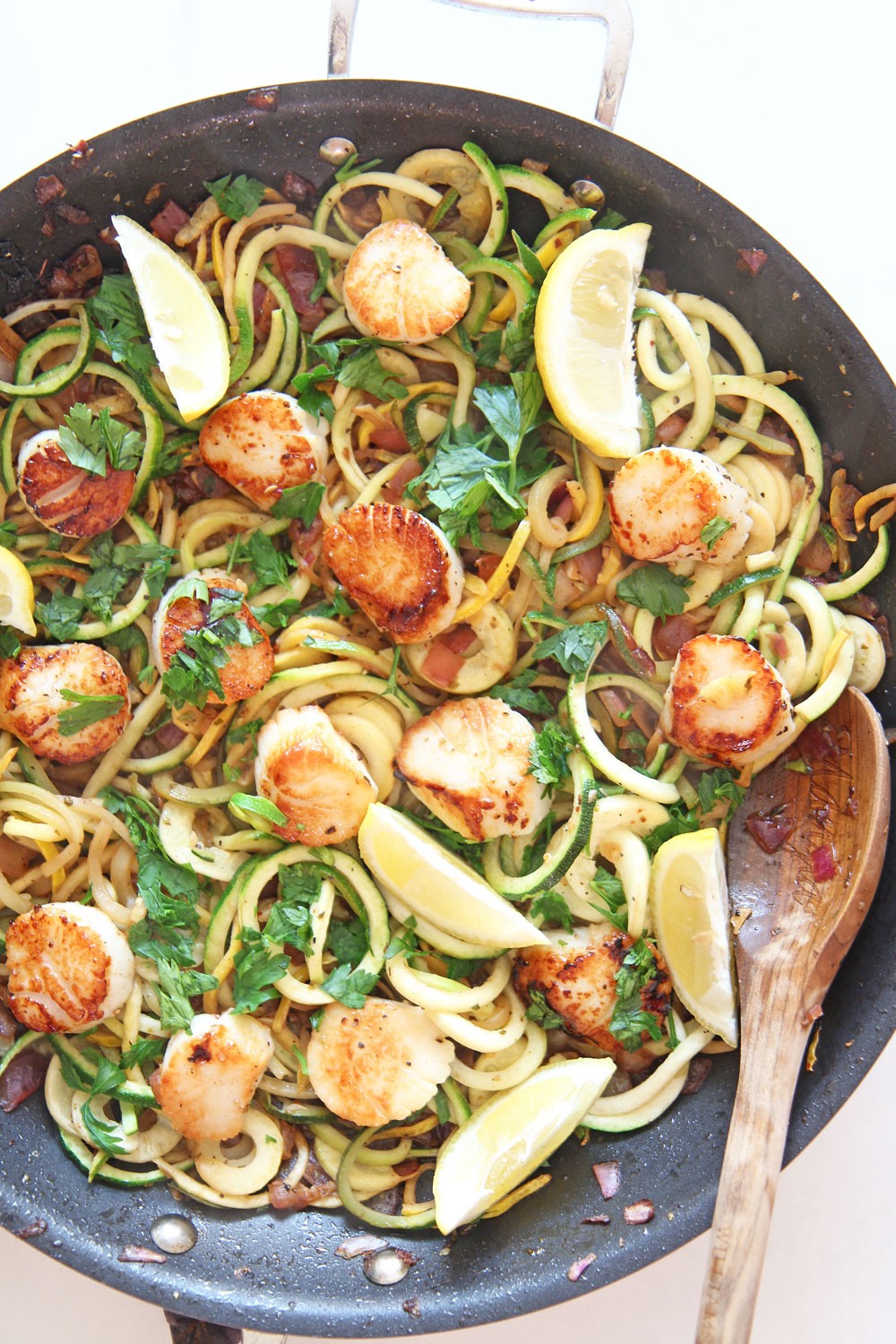 Scallop Scampi With Zoodles Recipe. Perfect one pan dinner with awesome seafood kiss. Grab scallops, garlic, lemon, vinegar, and zoodles. Perfect dinner fun for weeknight easy ideas. www.ChopHapy.com #scallops #scampirecipe