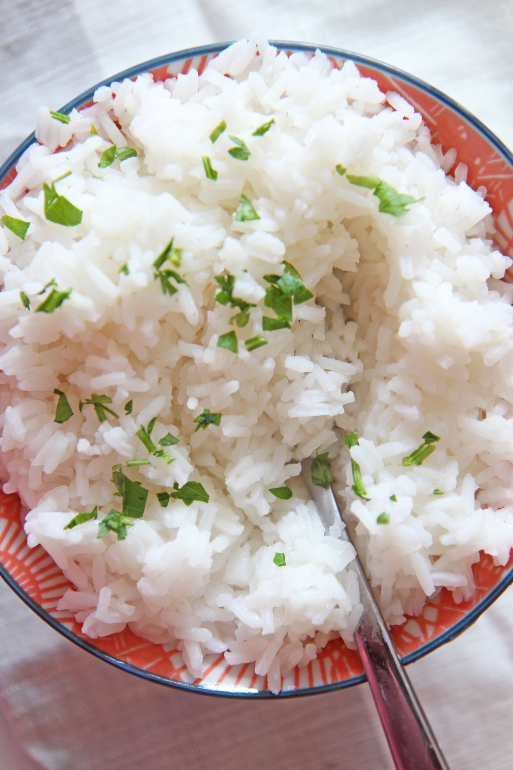 Rice Hack (Boil Rice Like Pasta). No more measuring or worrying about if rice will come out good. Foolproof way to make rice. www.ChopHappy.com #rice #easywaytomakerice 