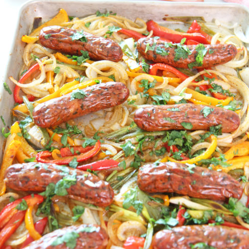 Sheet Pan Mexican Chicken Sausage and Peppers Recipe. This is a super quick sheet pan dinner. Grab smoked chicken sausage, peppers, jalapenos, adobo sauce, and fun herbs. Happy Cooking! www.ChopHappy.com #sheetpanrecipe #chickensausage