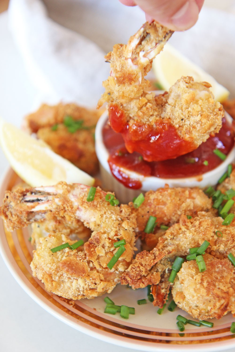 The Best Oven Fried Shrimp Recipe. Easy healthy version of fried shrimp. coat with flour, egg, and Ritz crackers. Then spray with avocado oil and bakes 10 minutes. www.ChopHappy.com #friedshrimp #ovenfriedshrimp