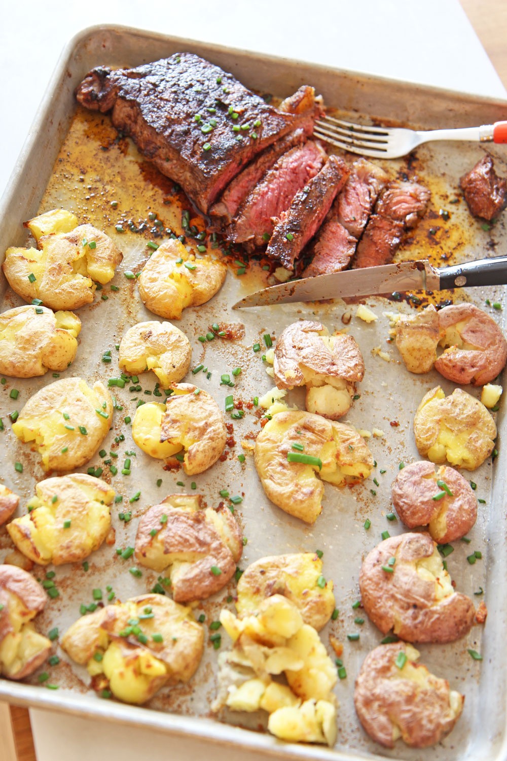 Pan Seared Steak with Crispy Potatoes - Over The Fire Cooking