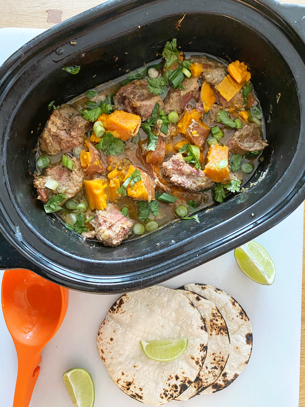 Slow Cooker Pork and Sweet Potato Salsa Verde Recipe. This is a five ingredient dinner recipe that is ready when you get home from work. You can make this into tacos, burrito bowls, or soup if you add chicken broth. Happy Cooking! www.ChopHappy.com #salsaverde #poekrecipe