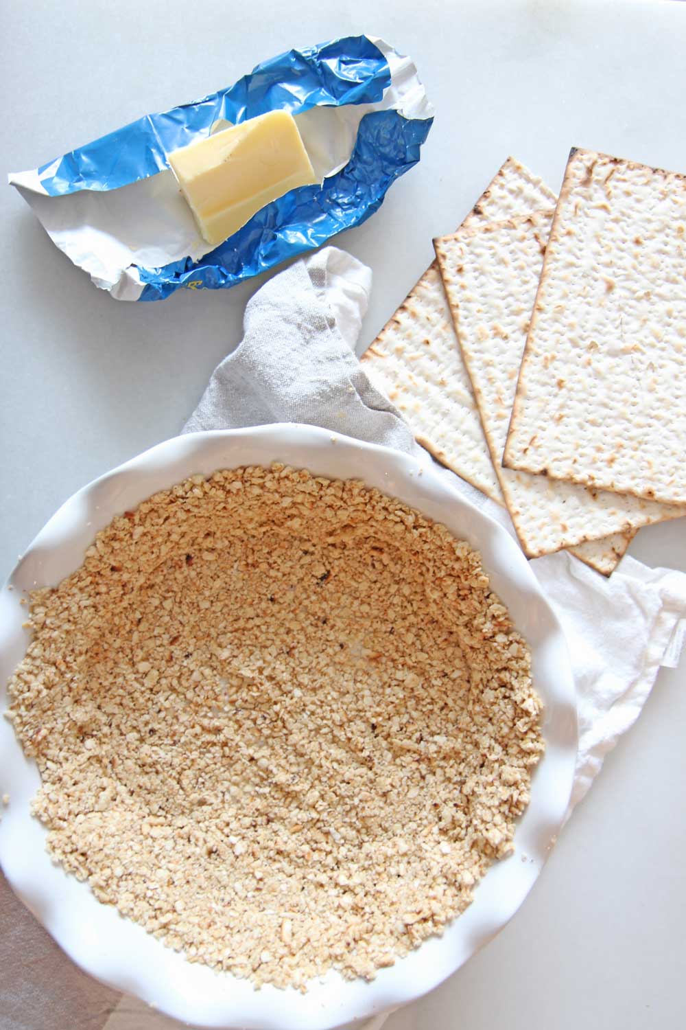 Matzo Pie Crust Recipe (3 Ingredients). The matzo, butter, and salt. So easy and great Passover Recipe! www.ChopHappy.com #Passover #Matzo #Passover Recipe