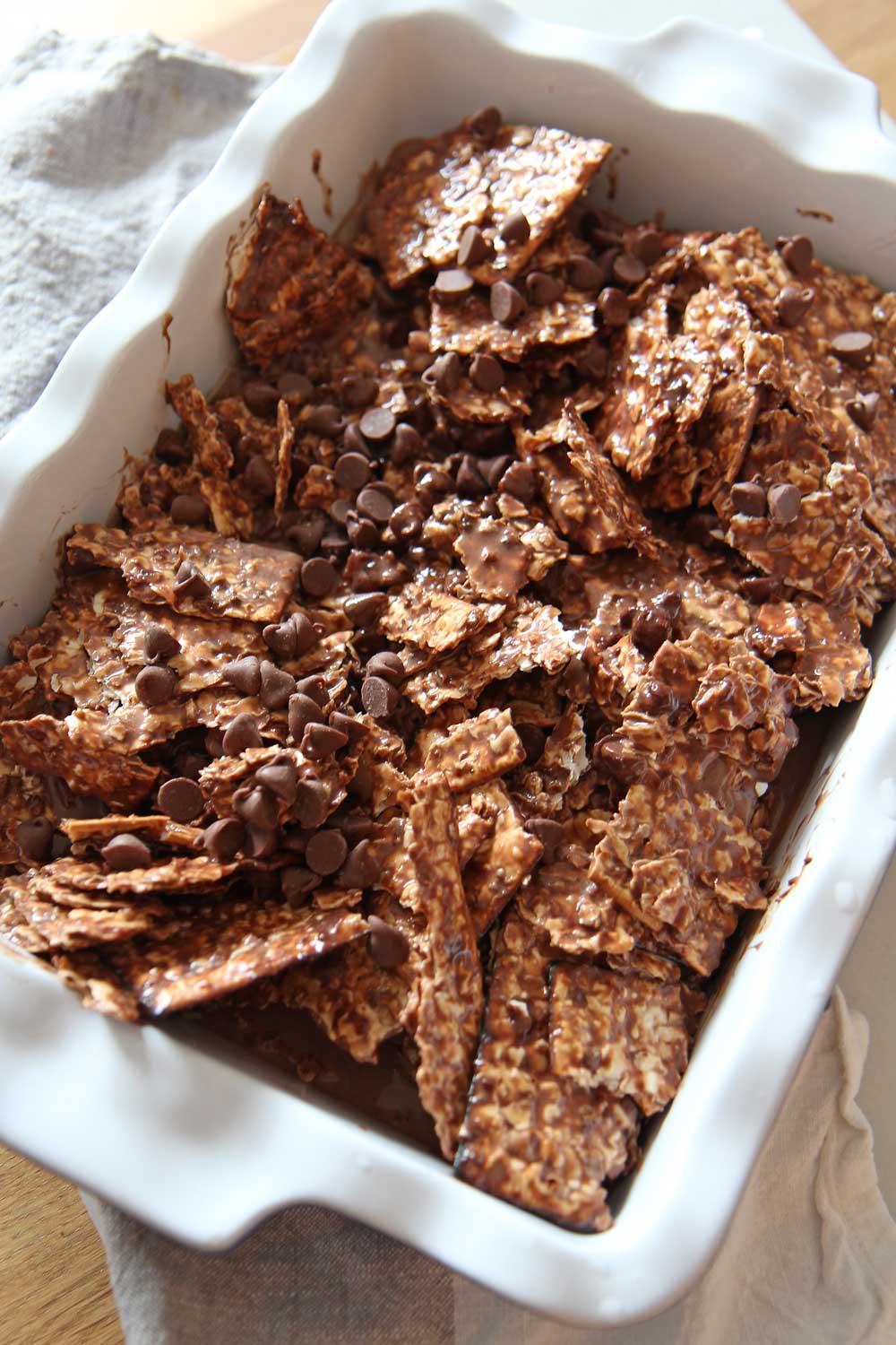 Triple Chocolate Matzo Bread Pudding Recipe. Matzo, Nutella, chocolate chips, cocoa powder make this so dessert fabulous. This is a perfect dessert for Passover and is make ahead easy. Happy Passover! www.ChopHappy.com #matzodessert #PassoverDessert