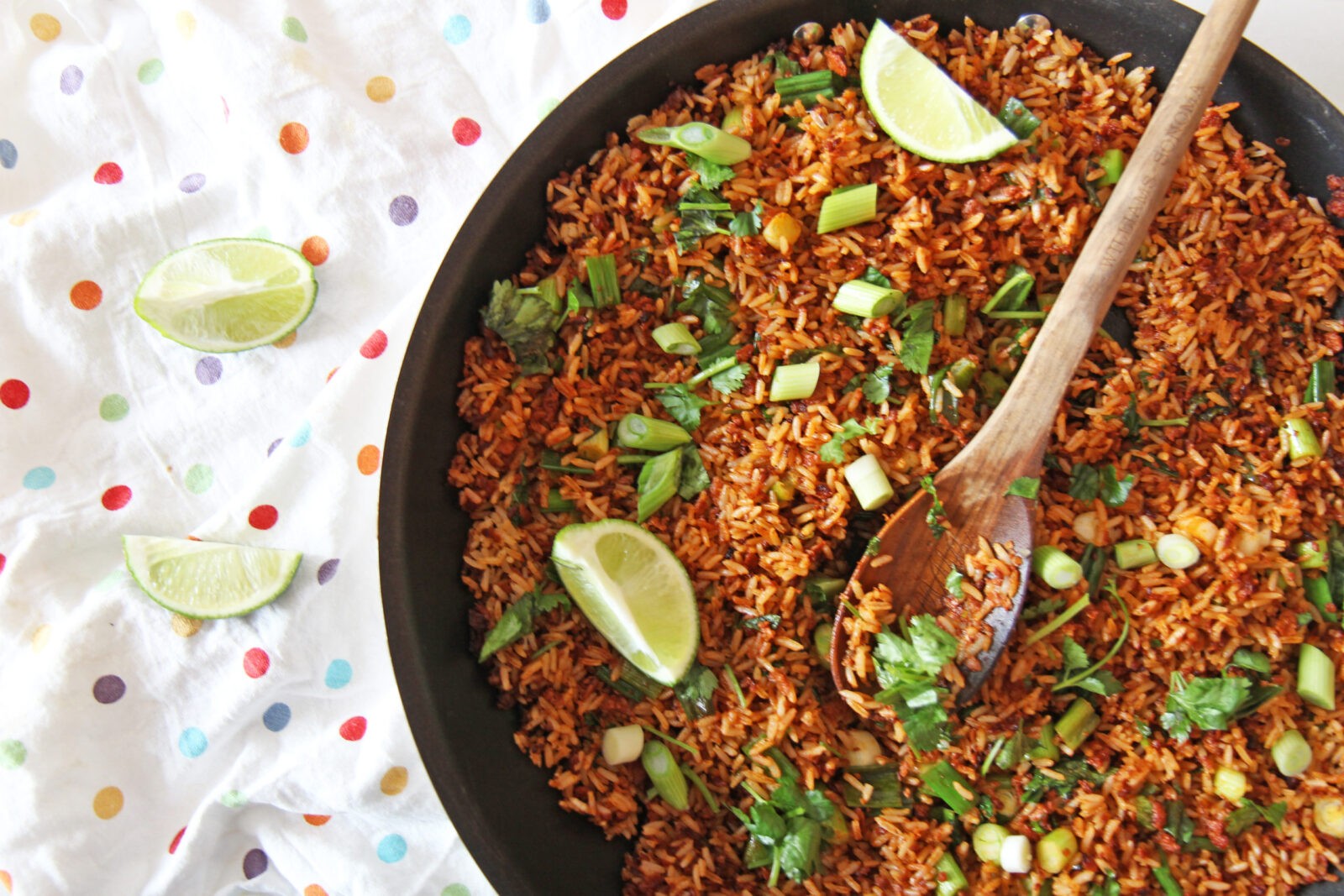 5 Ingredient Taco Fried Rice. Easy dinner for busy families. Rice, chorizo, scallions, cilantro, and lime. Also amazing leftovers. Happy Cooking! www.ChopHappy.com #friedrice #taco
