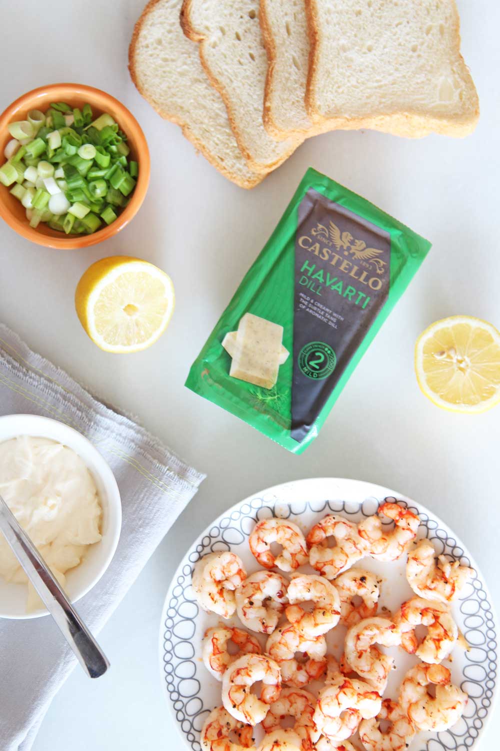 Shrimp and Dill Havarti Grilled Cheese Recipe. Bread, Castello Dill Havarti, mayo, lemon and scallions are all you need. This is a fast crunchy cheesy comfort food delight for a happy dinner. Happy Grilled Cheese Eating! www.ChopHappy.com #Ad #CastelloCheese #GrilledCheese