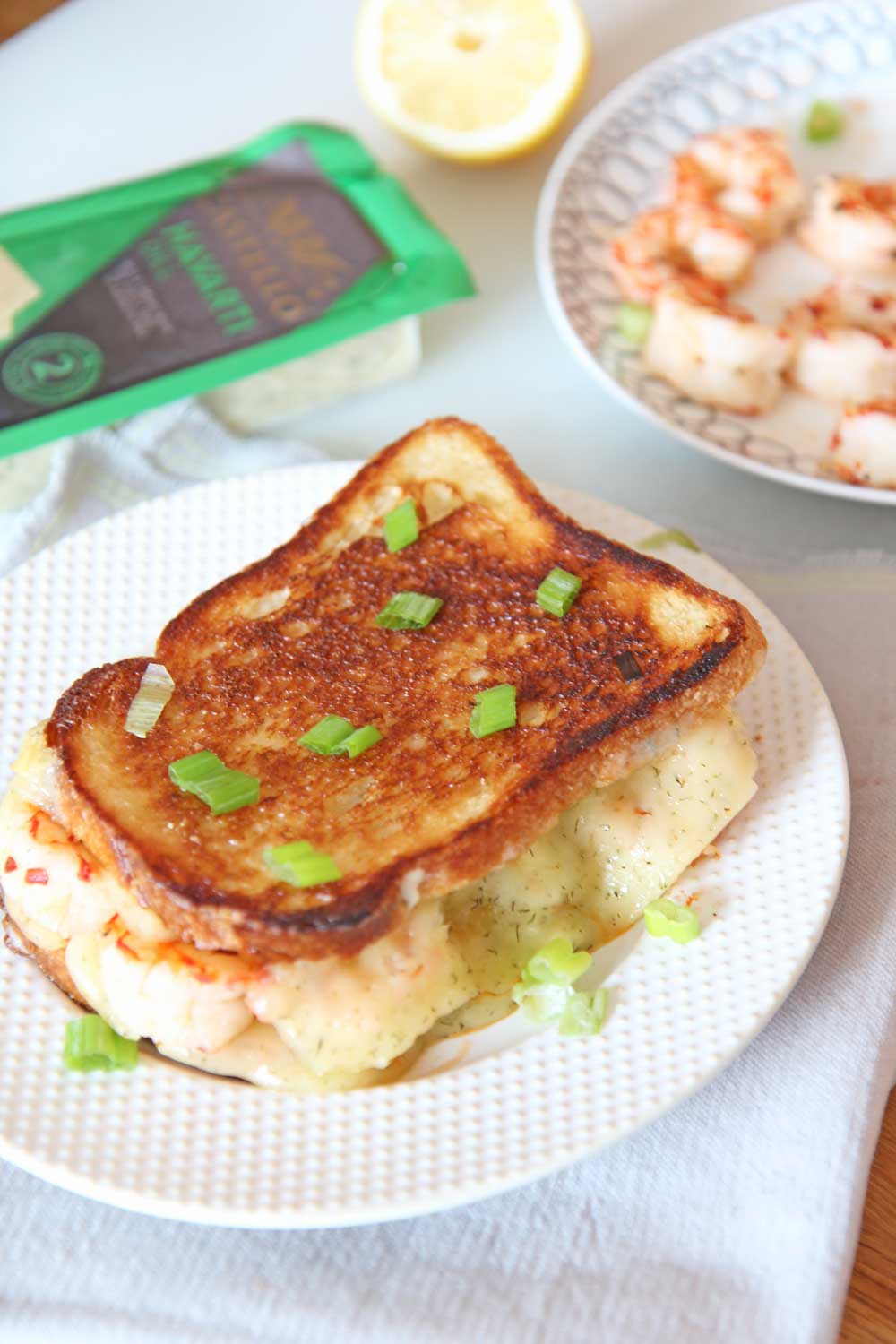 Shrimp and Dill Havarti Grilled Cheese Recipe. Bread, Castello Dill Havarti, mayo, lemon and scallions are all you need. This is a fast crunchy cheesy comfort food delight for a happy dinner. Happy Grilled Cheese Eating! www.ChopHappy.com #Ad #CastelloCheese #GrilledCheese