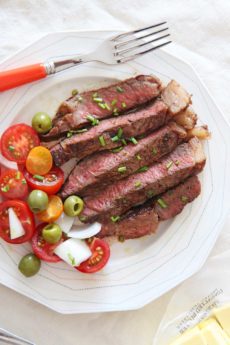 How to Reverse Sear a Steak. Its the easiest way to cook a steak. You can use a ribeye, NY strip, or any steak. You just need a sheet pan with a wire rack, cast iron pan, and butter. Happy steak making! www.ChopHappy.com #howtoreversesearasteak #reversesearedsteak