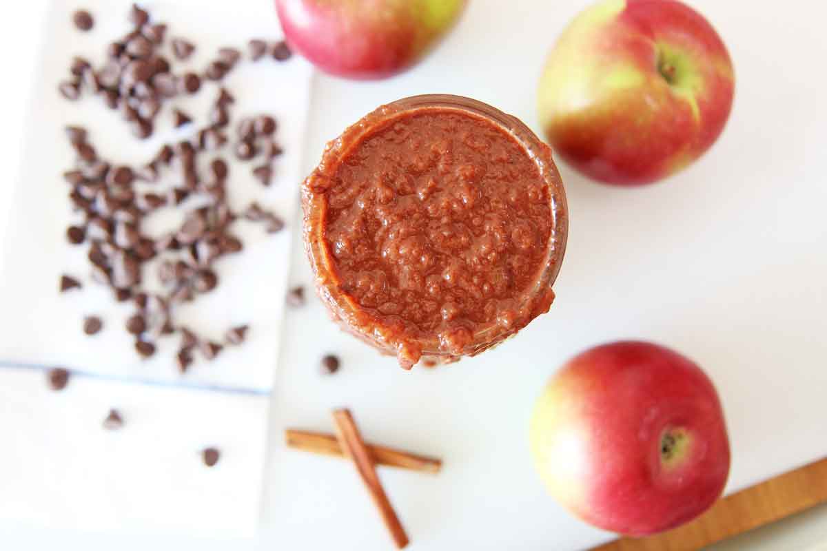 How to Make Chocolate Applesauce in a Slow Cooker.Apples, butter, brown sugar, cinnamon, orange juice, and salt are all you need. This is an easy slow cooker recipe for fall or Hanukkah. Happy apple cooking! www.ChopHappy.com #applerecipes #applesauce