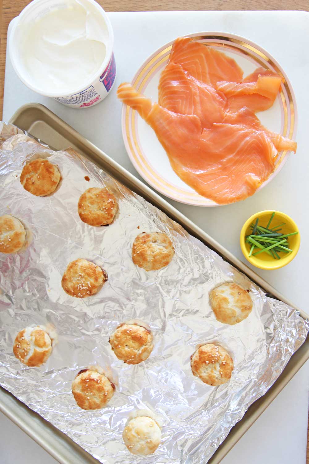 Lox and Potato Knish Recipe. This is potato knish, lox, sour cream, and chives. This is the perfect New Years appetizer, Holiday appetizer, or game night eats. This is super easy. Happy Cooking! www.ChopHappy.com