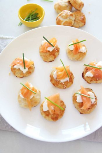 Lox and Potato Knish Recipe. This is potato knish, lox, sour cream, and chives. This is the perfect New Years appetizer, Holiday appetizer, or game night eats. This is super easy. Happy Cooking! www.ChopHappy.com