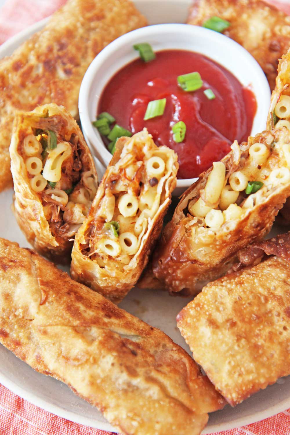 Leftover Mac and Cheese Egg rolls. Leftover Mac and cheese, short ribs, scallions, and lime make this the perfect leftover remake! www.ChopHappy.com #leftovers #eggrolls