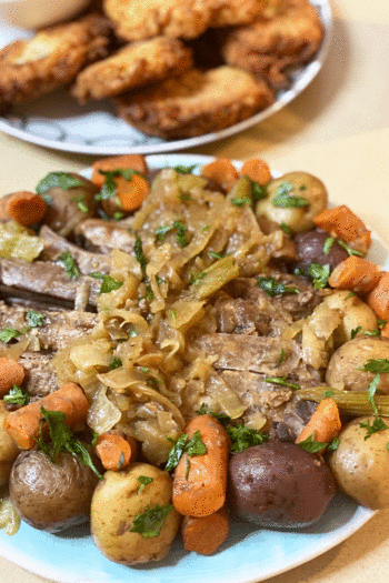 The Best Onion Soup Brisket Recipe. This is a one pot recipe, has potato side built in, and make ahead easy. Happy cooking! www.ChopHappy.com #brisket #JewishRecipes