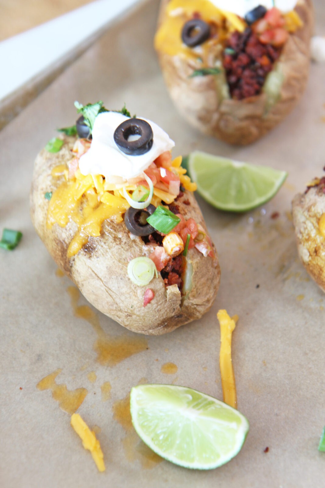 Baked Potato Tacos. Bake the potatoes in the microwave and add cheese, sour cream, chorizo, and salsa. Super easy Taco Tuesday dinner that is also a low carb taco. www.ChopHappy.com #tacoTuesday #tacos