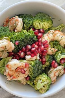 Easy Shrimp and Broccoli Salad. This is a perfect busy night dinner that has yummy leftovers. Broccoli, shrimp, pomegranates, Dijon mustard, and herbs. This is an easy Summer salad for a pool party. Happy Salad eating! www.ChopHappy.com #saladrecipe #broccolisalad