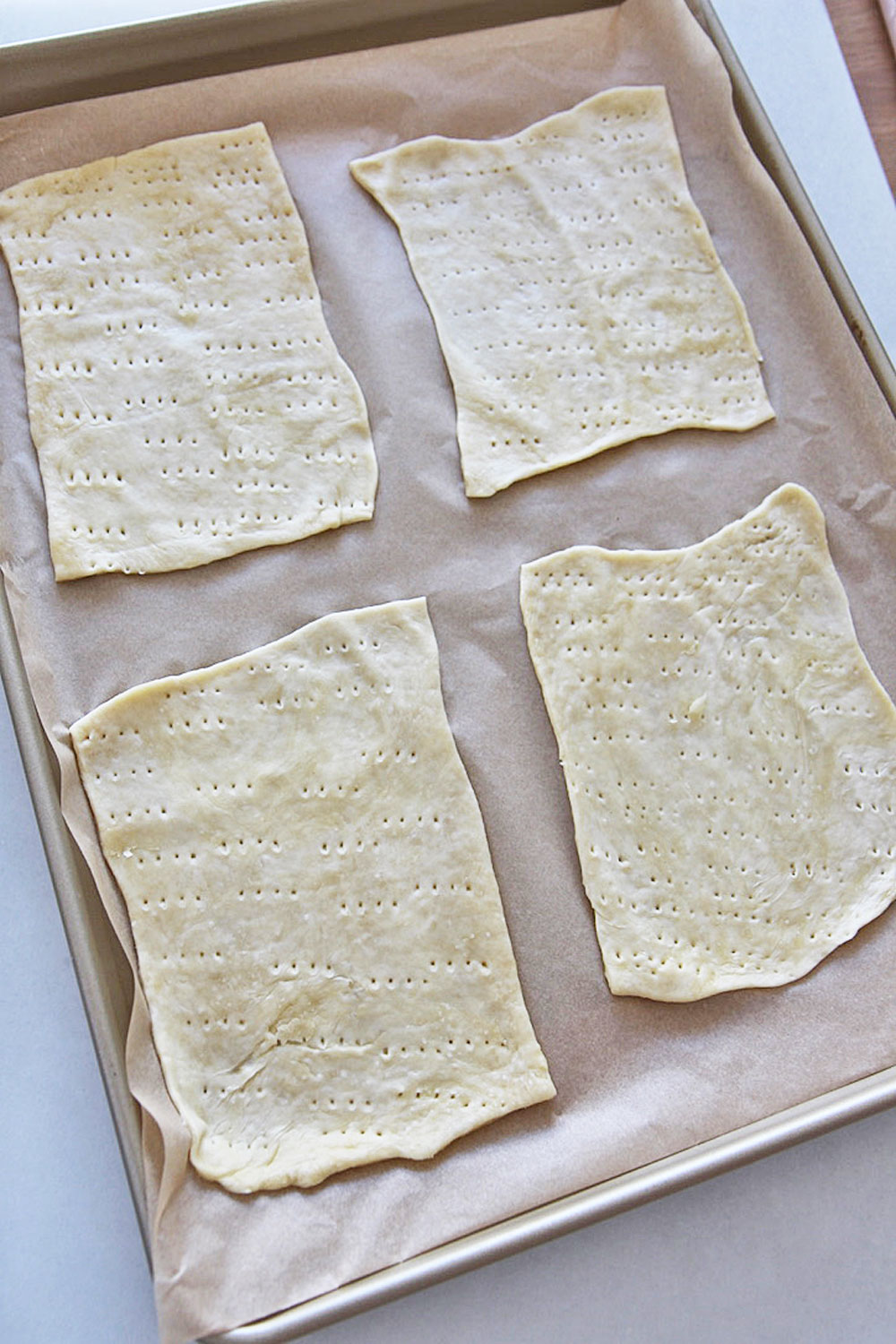 How to Make Matzah at Home.Homemade matzo is so easy because uses pantry ingredients, tastes bakery fresh, and its in honor of my moms Passover Seder! Happy Passover! www.ChopHappy.com #Passoverrecipes #matzorecipe