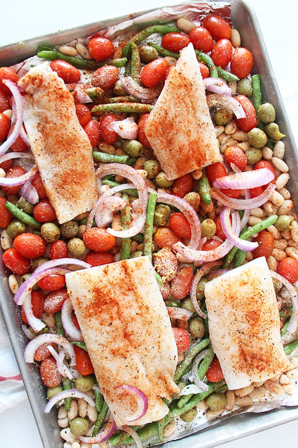 Sheet Pan Cod and Veggie Recipe. This is a quick weeknight dinner with very little clean up. Cod is the perfect fish recipe for an easy mild fish flavor. Happy Cooking! www.C hopHappy.com #codrecipes #fishrecipes