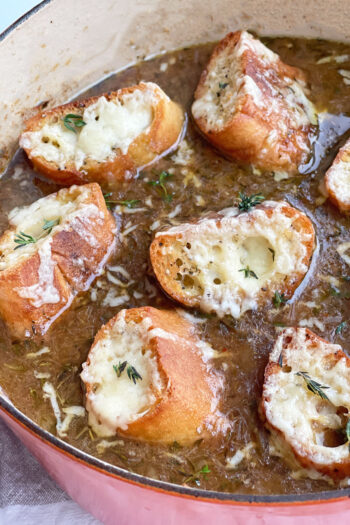 How to Make French Onion Soup. This classic French soup is super easy comfort food. You just need onions, seasoning, wine, gruyere cheese, and broth. Happy Soup Making! www.ChopHappy.com #FrenchOnionSoup #souprecipe