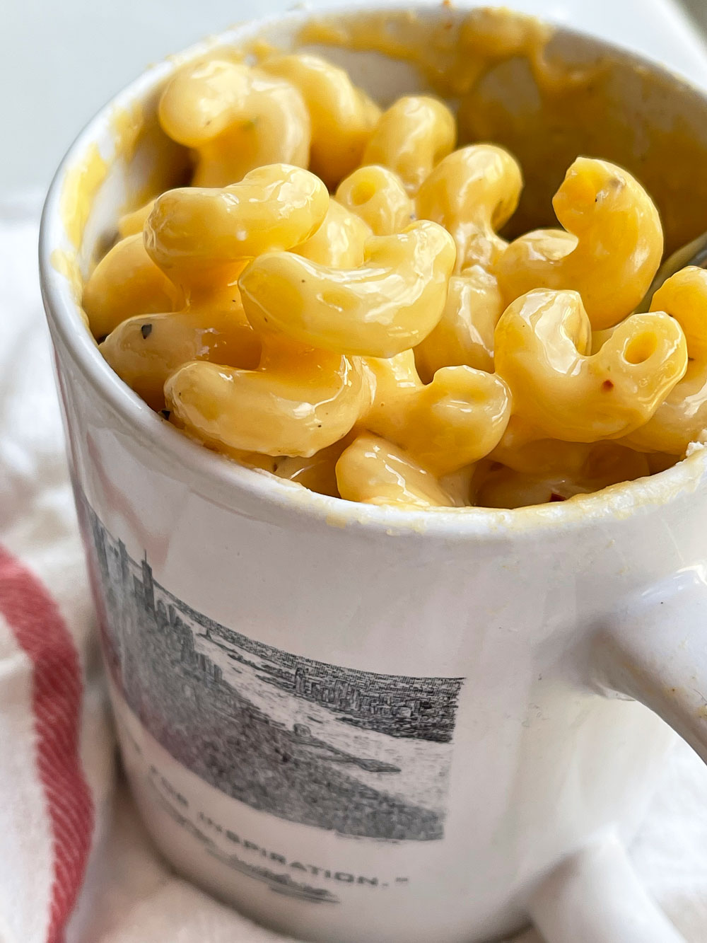 Microwave Mug Mac and Cheese. This is an easy recipe for midnight pasta cravings, easy dinner ideas, or someone who cooks for 1. Happy Pasta Making! www.ChopHappy.com #Macandcheesehack #mugmacandcheese