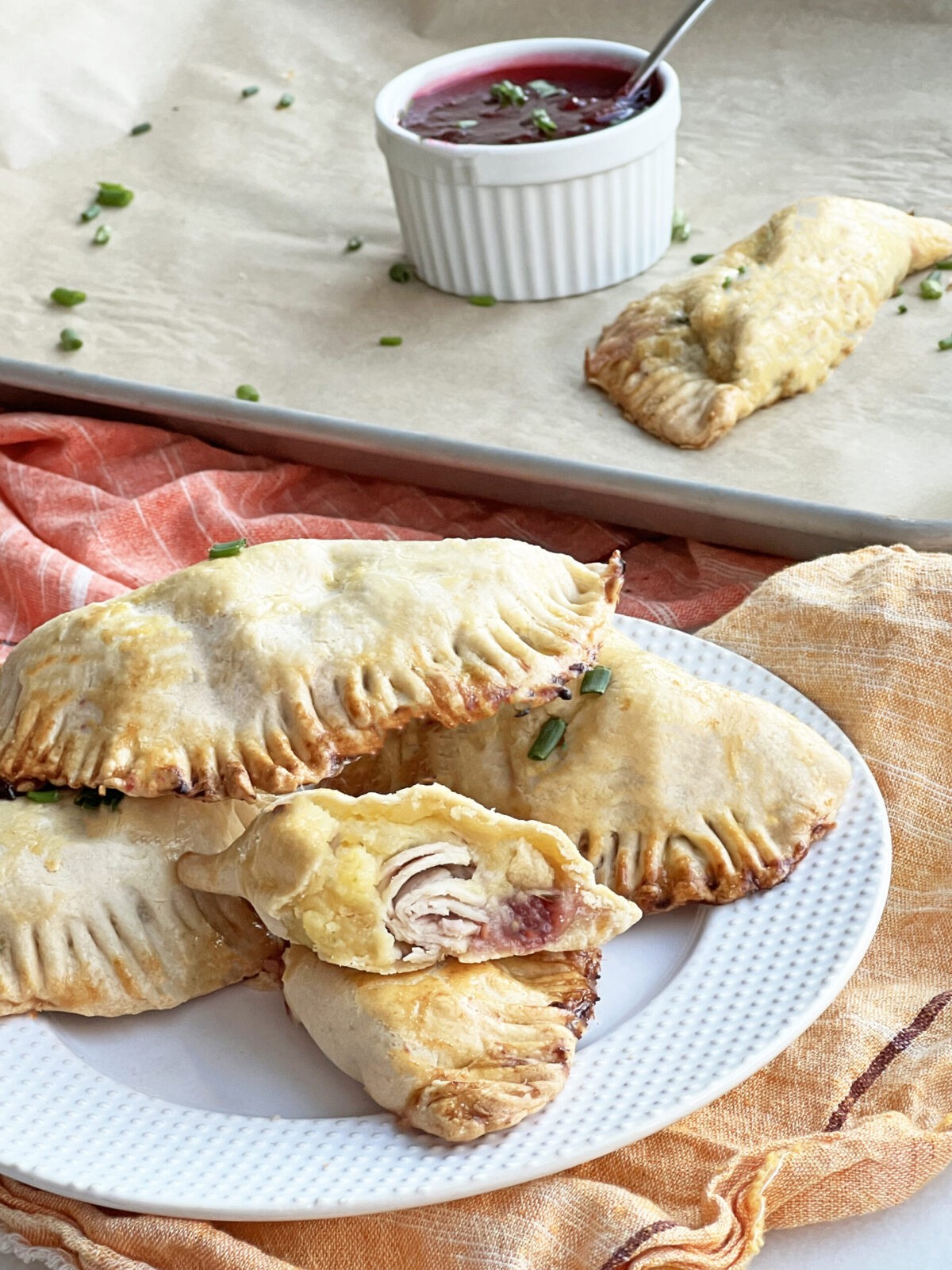 Holiday Individual Hand Pies. This is a great way to use leftover turkey, mashed potatoes, cranberries, and cheese. www.ChopHappy.com #leftoverholidayideas #potpies