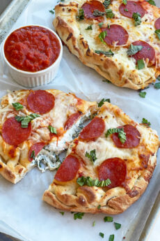 Pizza Calzone Recipe. This is the ultimate comfort food. This is an easy calzone recipe with a pepperoni topping. www.ChopHappy.com #pizzarecipe #calzonerecipe