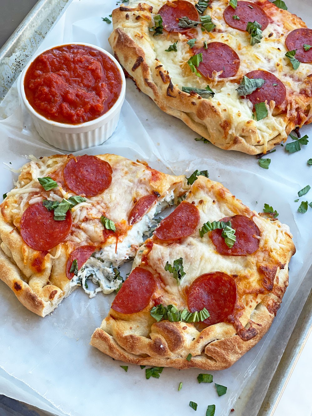 Pizza Calzone Recipe. This is the ultimate comfort food. This is an easy calzone recipe with a pepperoni topping. www.ChopHappy.com #pizzarecipe #calzonerecipe