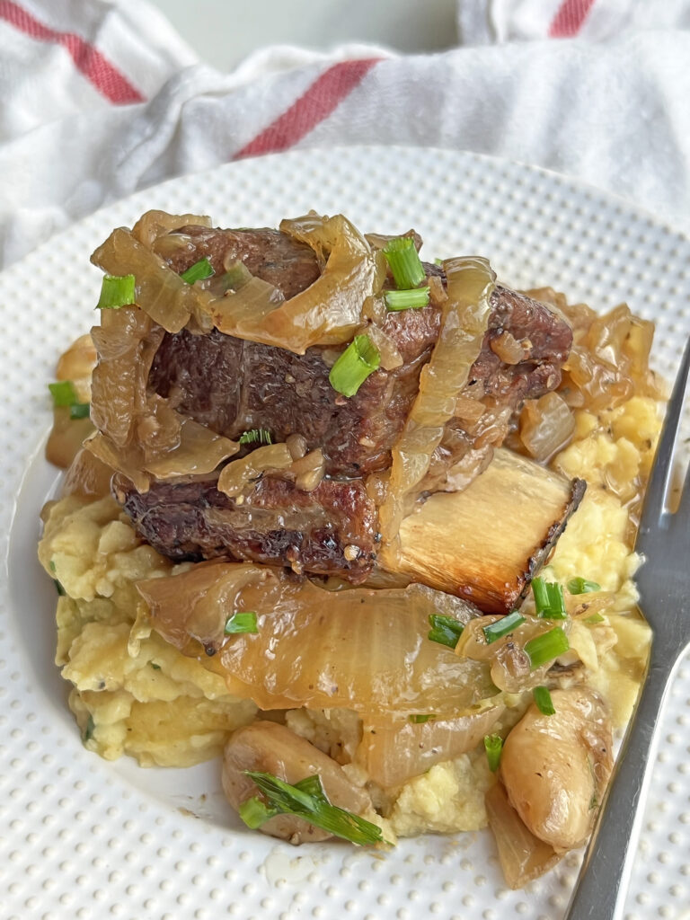 French Onion Soup Short Ribs Recipe. This is a n easy comfort food recipe for beefy yum. Happy Cooking! www.ChopHappy.com #shortribs #frenchonionsoup