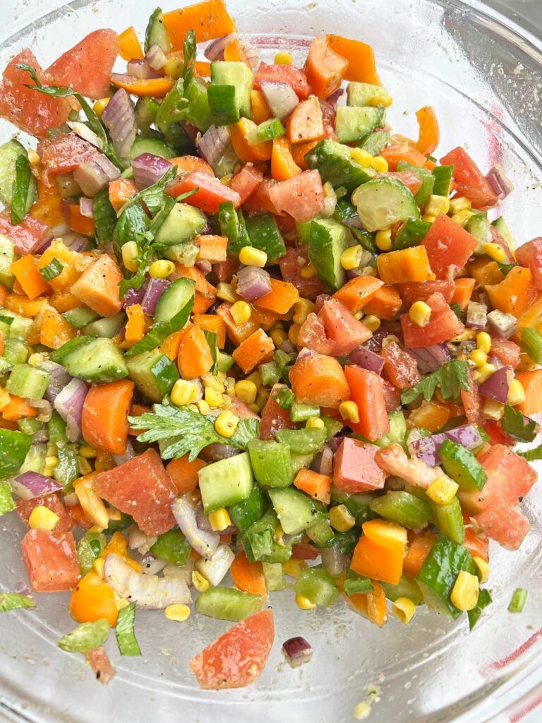 Crunchy Rainbow Salad w/ Pesto Dressing. Healthy recipe that you can make one day and eat all week long. The perfect meal prep recipe. www.ChopoHappy.com #vegetables #saladrecipe